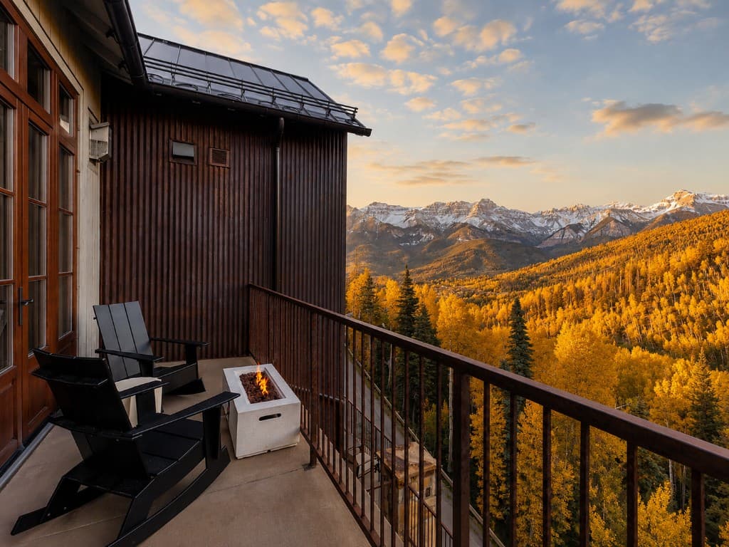 Private fire table on the patio overlooking golden aspens